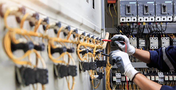 Professional Electrician technician working in Calverton, NY
